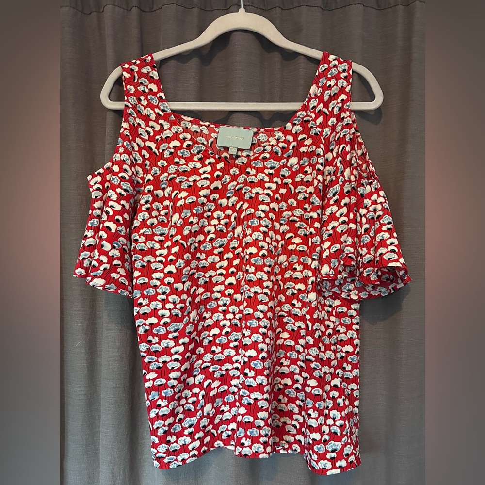 Red floral blouse
